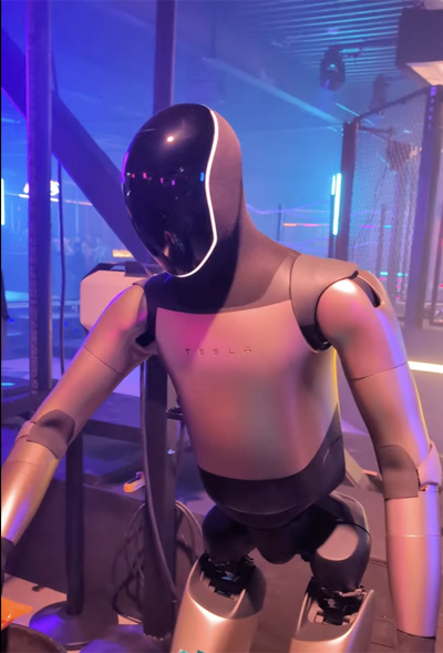 Jit Ray Chowdhury with Tesla Optimus robot