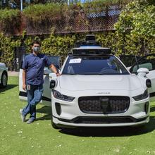 Jit Ray Chowdhury with Waymo autonomous Jaguar I-PACE